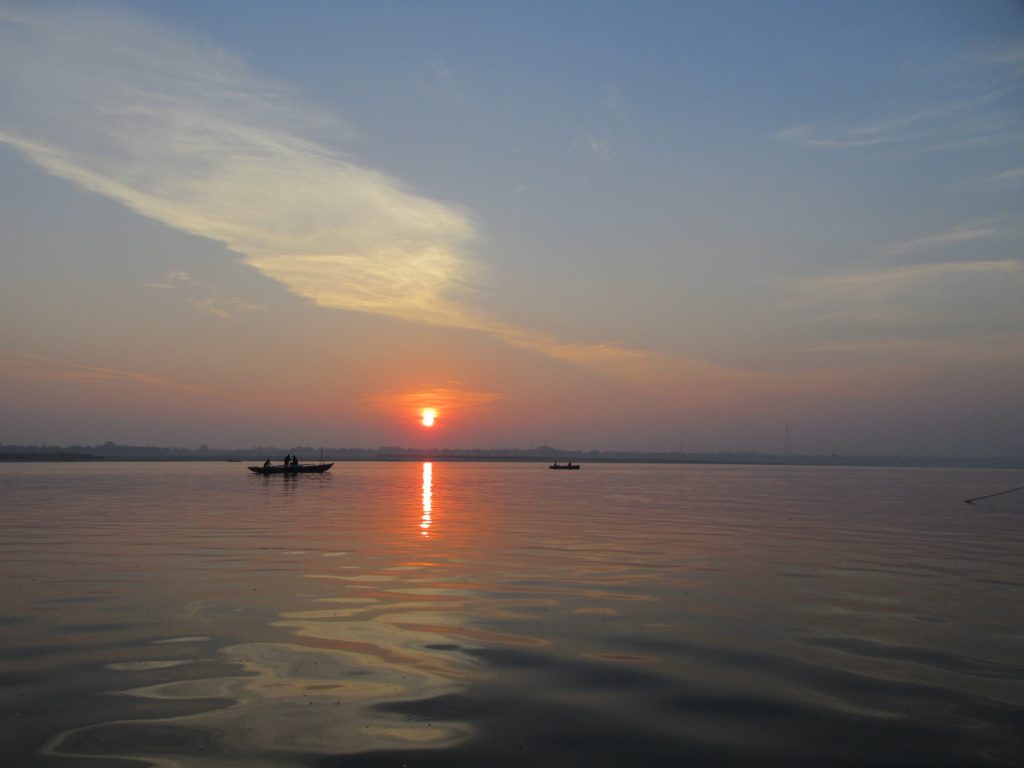Sunset canoe trips across the Ganges river.