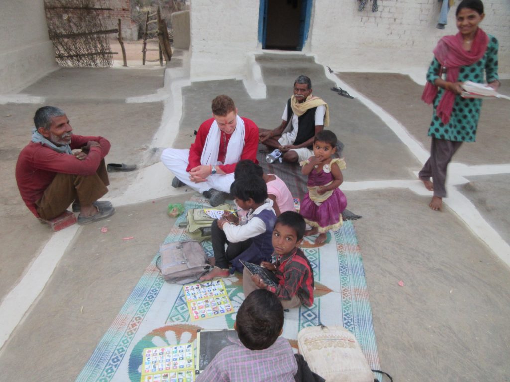 The second family of children we gifted learning materials to, and here I’m giving English lessons.