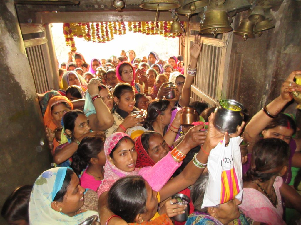 Hindu devotees ringing the bells in the temple in honor of Shivaratri.