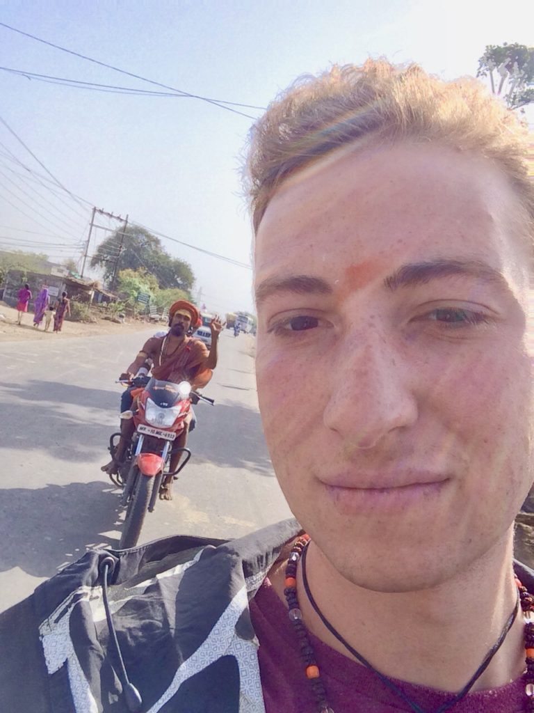 Selfie with Adit Baba on a motorbike en route to Mahakaleshwar. I am riding on the back of Mahese’s bike.