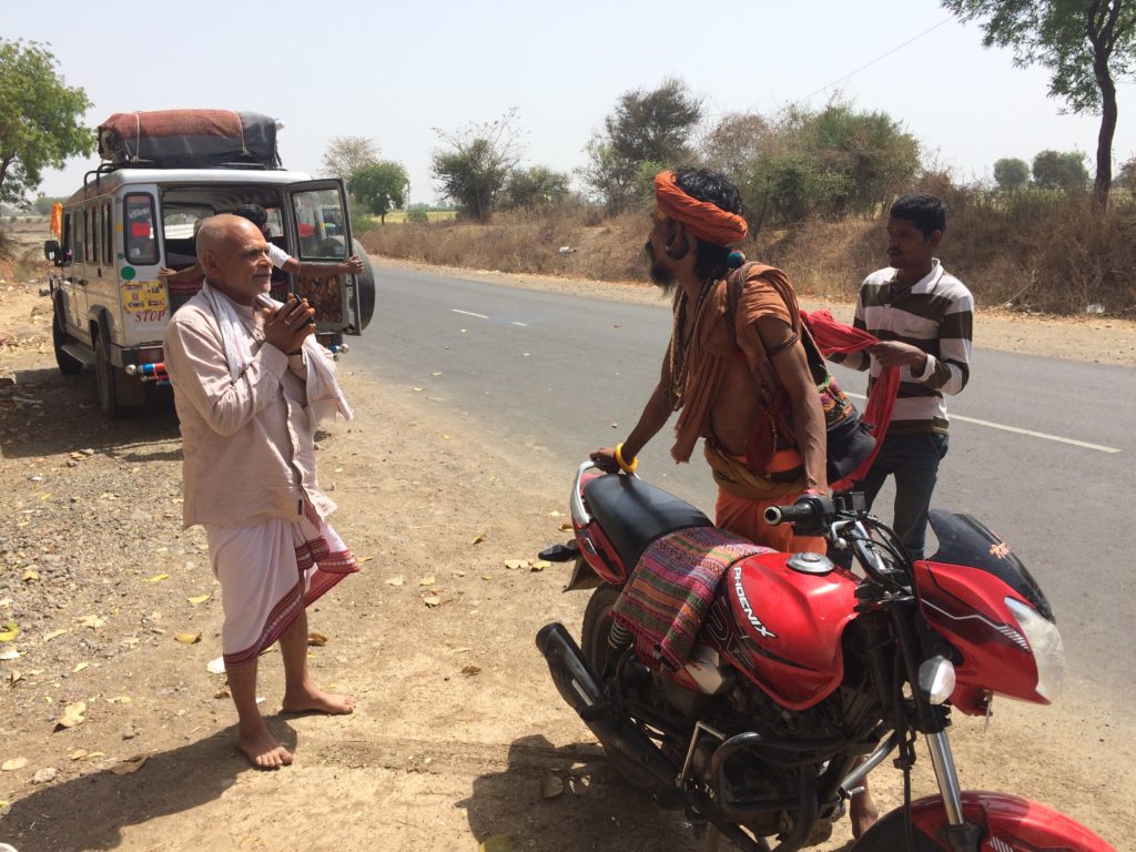 Hindus stopped us on the road, in order to give donations of rupees to Adit Baba.