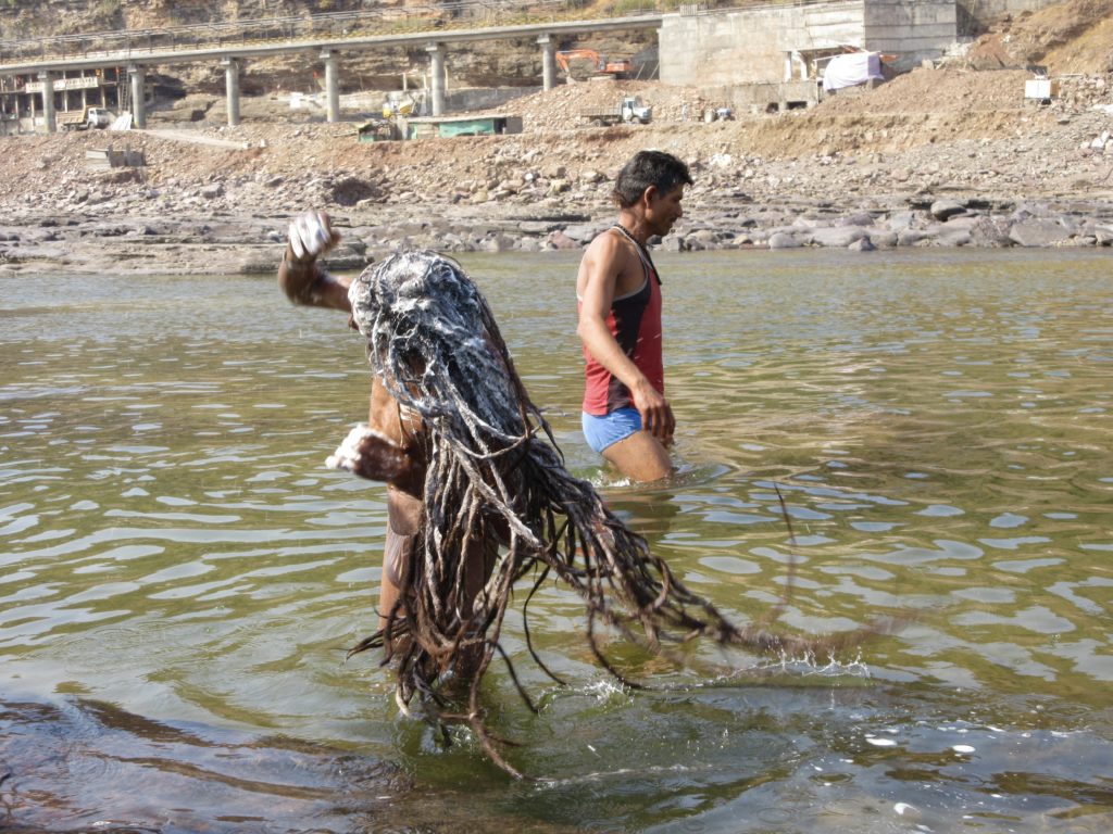 Big Baba Ji whipping around his shampooed dreadlocks in the Narmada river. #IWhipMyHairBackAndForth